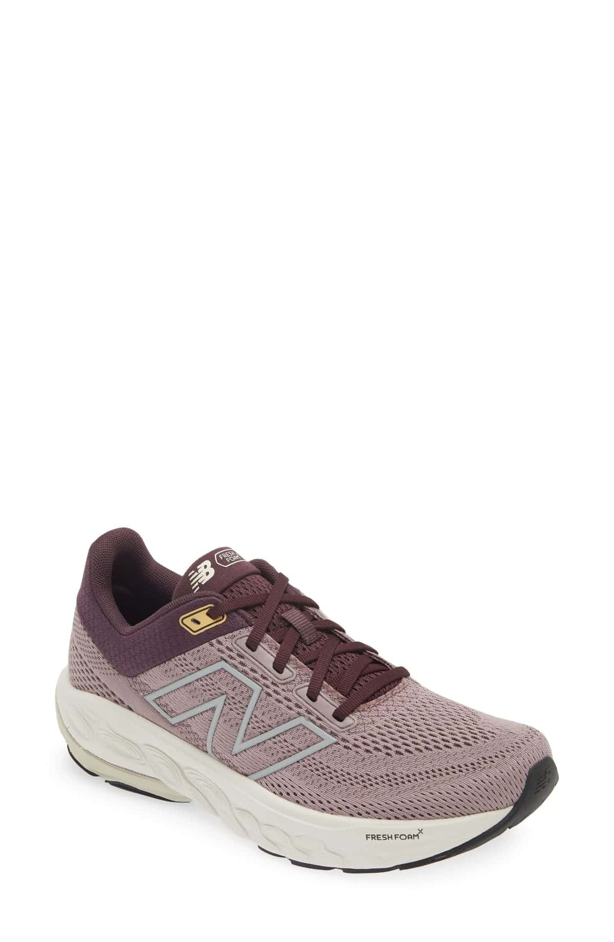 Zapatilla de running New Balance Fresh Foam X 860 v14 en malva, con cuello y cordones bordó, N plateada y mediasuela blanca